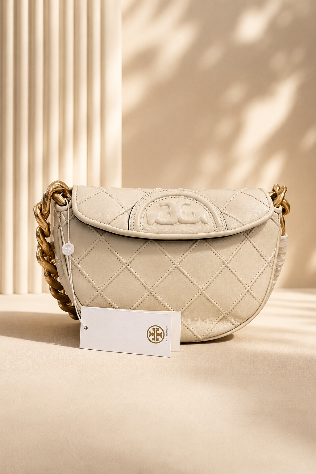 Tory Burch Quilted Leather Crescent Shoulder Bag – Luxury Cream Crossbody with Gold Chain Accent